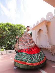 Traditional dola silk twirling lehengas in red
