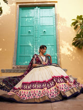Tussar silk and patola print Lehenga in off white and purple