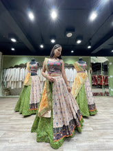 Traditional green bandhani and Patola chaniya choli - readymade
