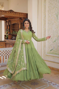 Pastel 5 layer gowns with sequinned dupatta in parrot green