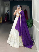 White lucknowi Lehenga with purple dupatta
