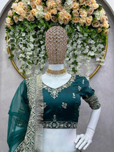 Emerald green and gold motifs lehenga