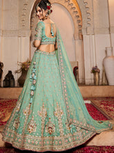 Mint Green Embroidered tissue fabric Lehenga