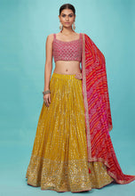 Karla collection - yellow and pink bandhani Lehenga