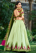 Tussar silk tilakavati Lehenga in pista green