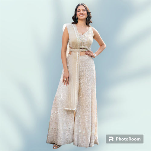 Off white crop top and palazzo with belt