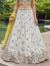 White and yellow chiffon embroidered Lehenga