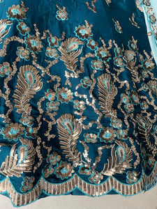 Teal blue embroidered Georgette Lehenga with the sky blue dupatta