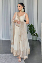 White georgette gown with gold sequins