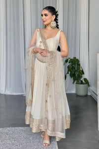 White georgette gown with gold sequins