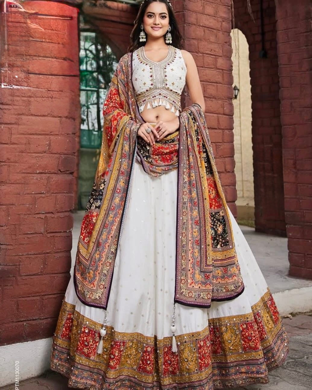 Elegant white embroidered Chaniya Choli with colourful dupatta
