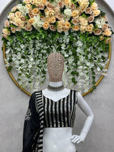 Black, silver sequins and multi florals