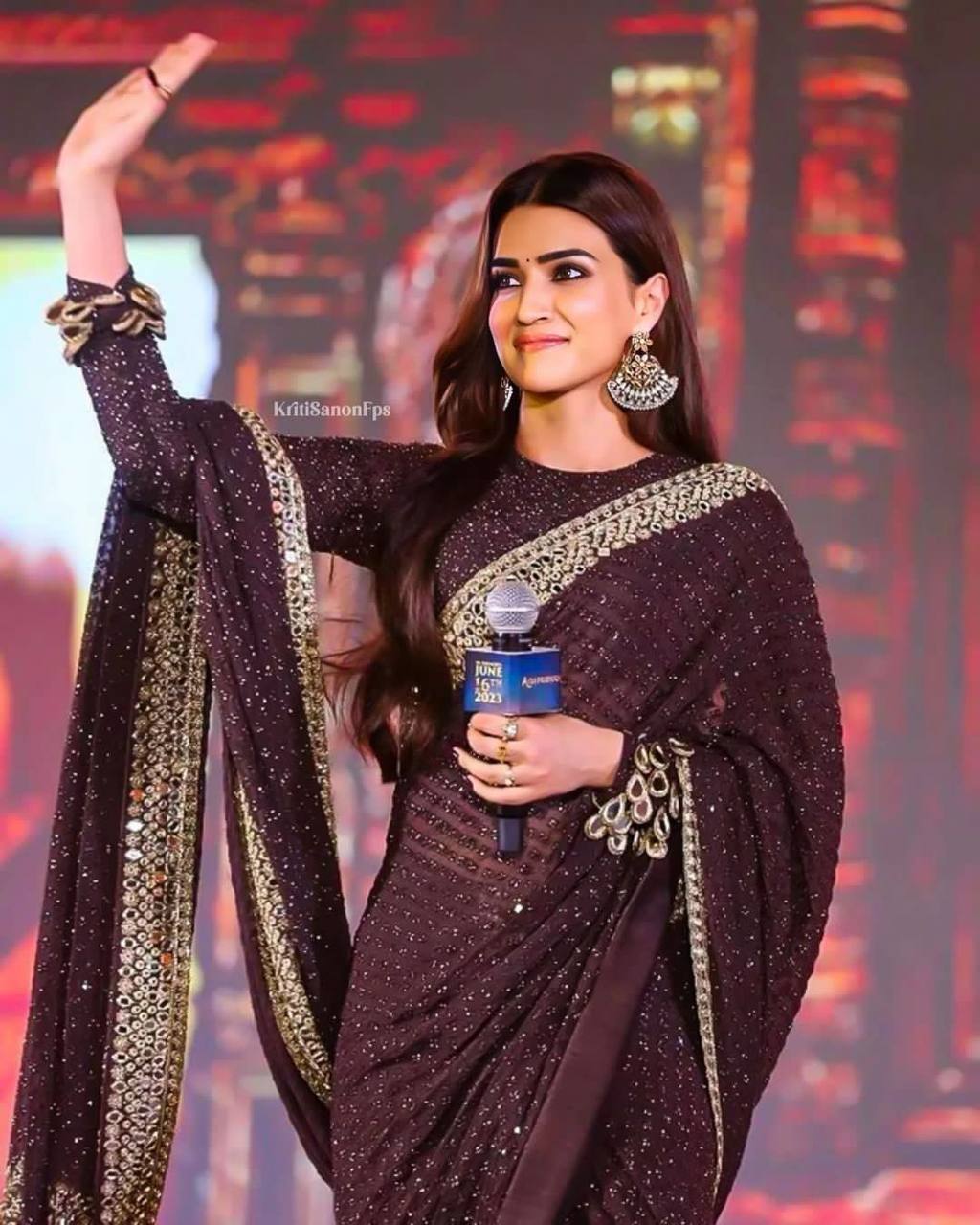 Kriti inspired black and gold sequins saree