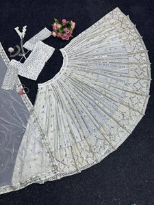 Beautiful white Lehenga with silver sequins