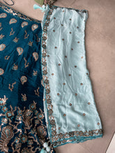 Teal blue embroidered Georgette Lehenga with the sky blue dupatta