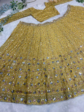 Yellow and gold embellished Lehenga