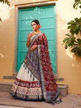 Tussar silk and patola print Lehenga in white and maroon