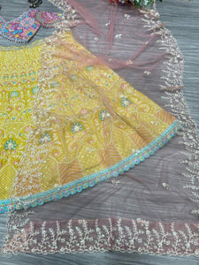 Pastel yellow and baby pink thread work Lehenga