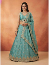 Blue and gold zari silk lehenga