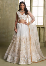 Off white and gold Lehenga