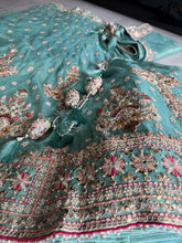 Mint Green Embroidered tissue fabric Lehenga