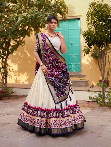 Tussar silk and patola print Lehenga in white and purple