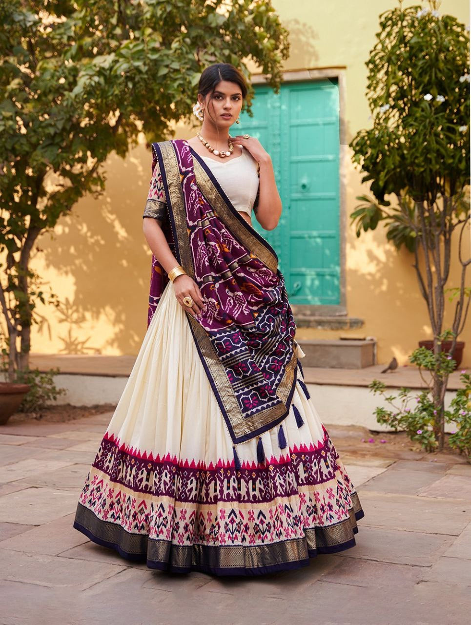 Tussar silk and patola print Lehenga in white and purple