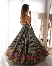 Black, silver sequins and multi florals