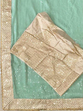 Sea green georgette saree