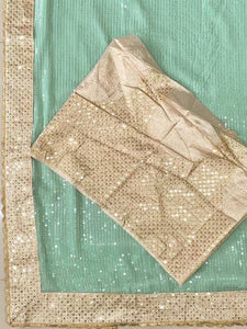 Sea green georgette saree