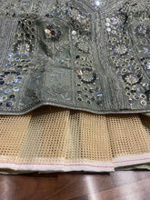 Exquisite diamond silk sage green Lehenga with contrasting colours