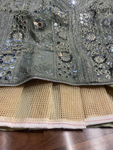 Exquisite diamond silk sage green Lehenga with contrasting colours