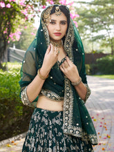 Dola silk jacquard Lehenga in green