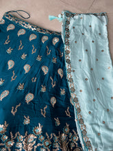 Teal blue embroidered Georgette Lehenga with the sky blue dupatta