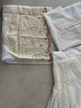 White lehenga with thread work and green bandhani dupatta