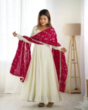 Silk off white gown with dark pink lace dupatta