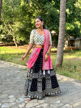 Contrasting colours of chinon silk Lehenga