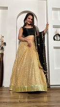 Black and gold silk Lehenga
