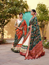 Tussar silk and patola print Lehenga in white and green