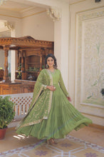 Pastel 5 layer gowns with sequinned dupatta in parrot green