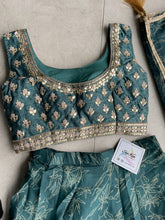 Green Organza silk readymade Lehenga (elbow length sleeves attached)