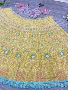 Pastel yellow and baby pink thread work Lehenga