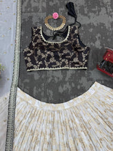 Black and off white jacquard Lehenga