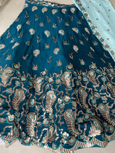 Teal blue embroidered Georgette Lehenga with the sky blue dupatta