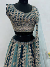 Aqua and dark green panelled Lehenga