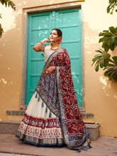 Tussar silk and patola print Lehenga in white and maroon
