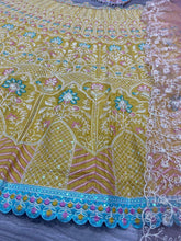 Pastel yellow and baby pink thread work Lehenga