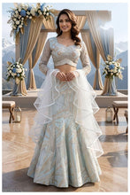 Icy blue lehenga with champagne gold work