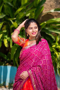 Orange jacquard silk and pink bandhani Lehenga