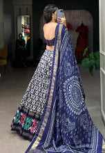Tussar silk ikkat print Lehenga in navy blue (skirt stitched)